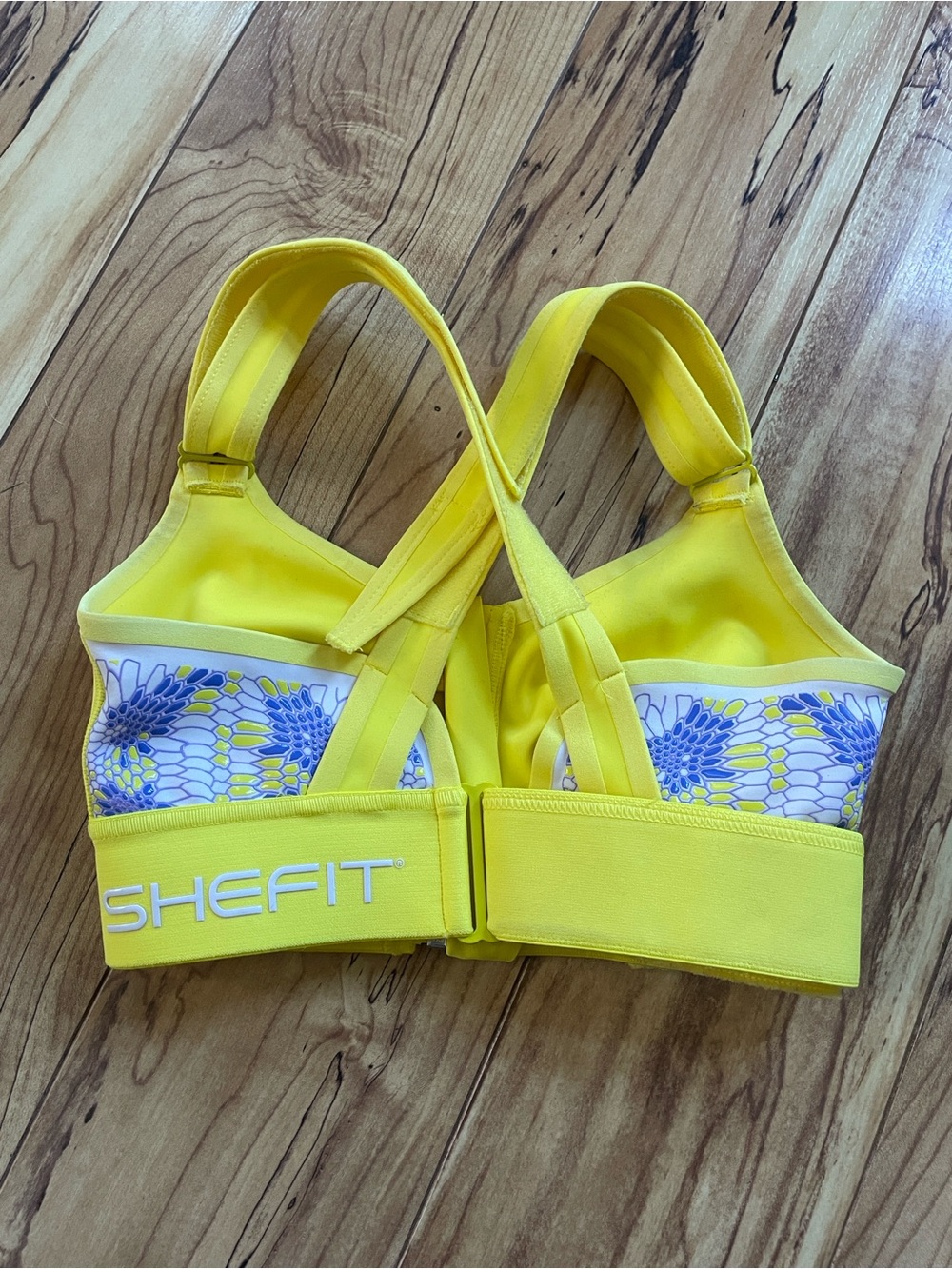 SHEFIT Bright Yellow Sports Bra with Blue Floral Panels